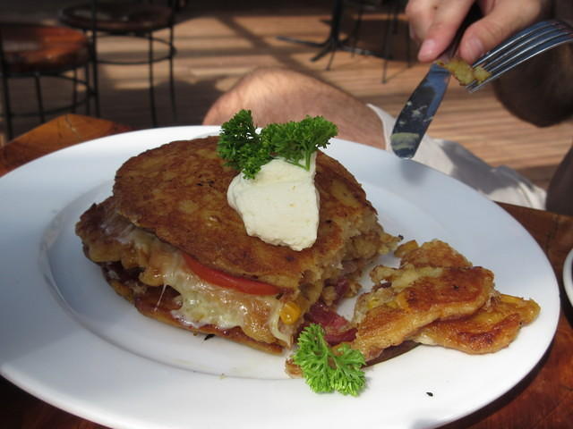 Trying some local cuisine - Corn fritters.  Very delicious!