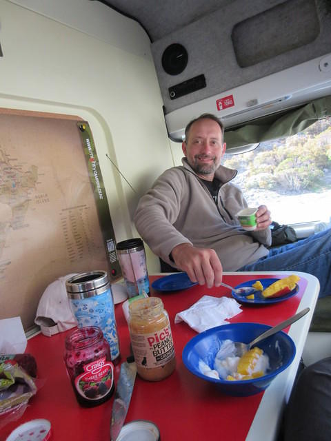 Breakfast with a fantastic view!  Yogurt with fresh mango and half a peanut butter and jelly sandwich.  Yum!