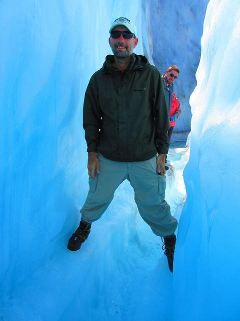 Walking a narrow ridge above a glacier river.  Don't fall in!