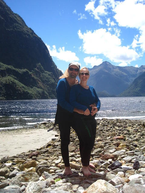Posing for a picture in our lovely wetsuit and kayaking shirt.