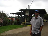 Mickey in front of the processing plant.