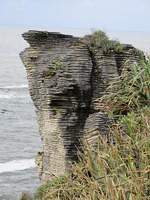 The pancake rocks are layers of limestone that are gradually eroding away.