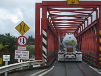 This was the craziest one lane bridge.  Notice below the truck are railroad tracks.  Hopefully there isn't a train in front of that semi.  Why can't they just build their bridges with two lanes???