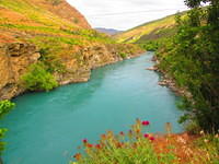 Taking a break along some wonderfully teal blue rivers.