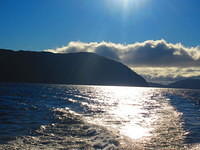 Taking a boat across Lake Manapouri very early in the morning.