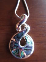 This is my new necklace.  It is the double infinity twist which in the Maori culture symbolizes a bonding love for all eternity.