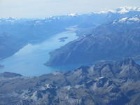View from the plan of Lake Wakatipu with Glenorchy and the Dart River in the distance.