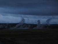 Steam rising from some Geysers at dusk